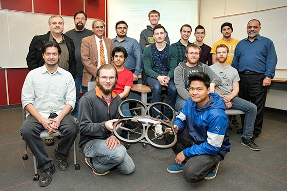 Students and instructors show off a quadcopter. The Engineering and Applied Science class is laying the groundwork for further collaborations between Sask Polytech and the U of R. Photo by Trevor Hopkin - U of R Photography.