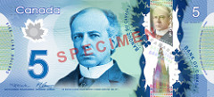 A Canadian blue $5 bill, featuring a portrait of Sir Wilfrid Laurier, Canada's seventh prime minister, and various security features, along with symbols representing Canada's cultural and historical heritage.