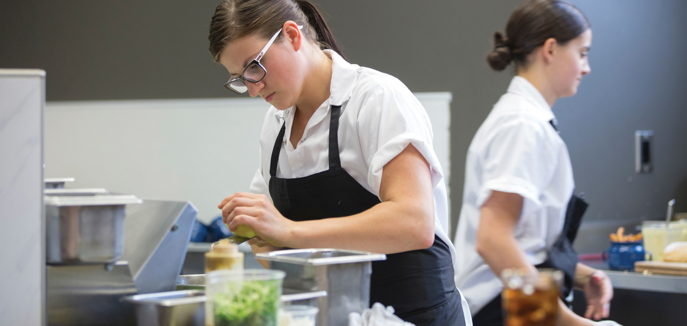 Students practicing their cooking skills