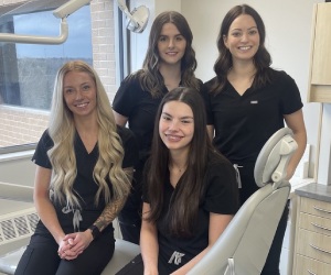 Four second-year dental students in a dental clinic