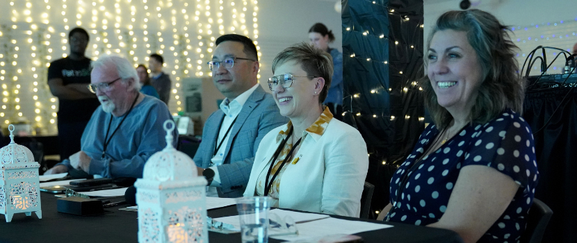 Four judges sitting in a row 