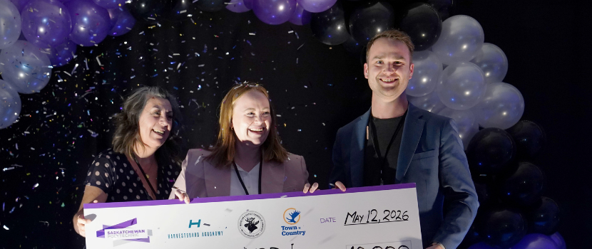 First place winner receiving a cheque