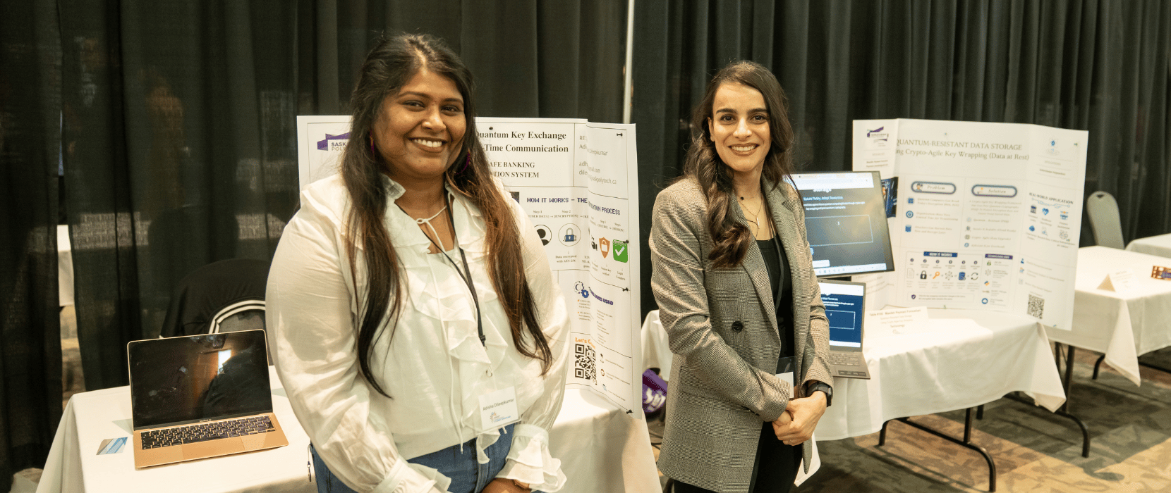 Showcase event 2026 - Two people discussing a presentation board titled 