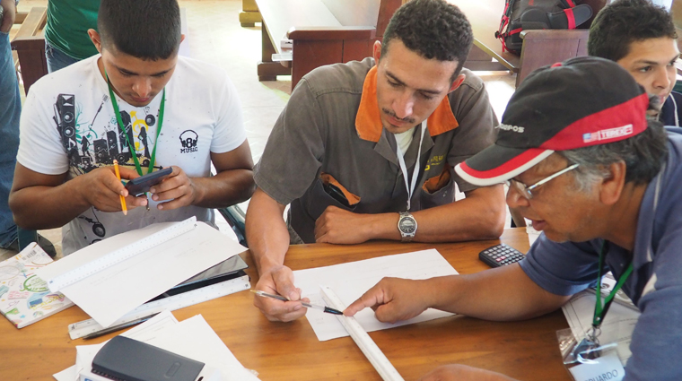 Instructors teaching map and scale. Image credit: Saskatchewan Polytechnic