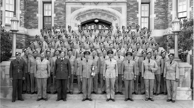 Photo credit: [a-2409] courtesy of Saskatoon Public Library. Group photo of Initial Training School Course 83, "Y" Flight cadets and officers in uniform. Date: August 1943
