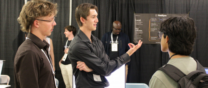 two students talking at a conference centre