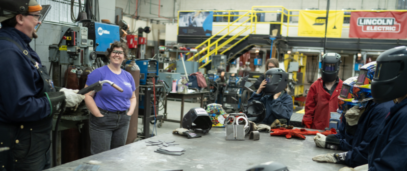 Girls in welding shop