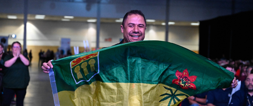 Ranieri dos Santos Vilela with Sask flag