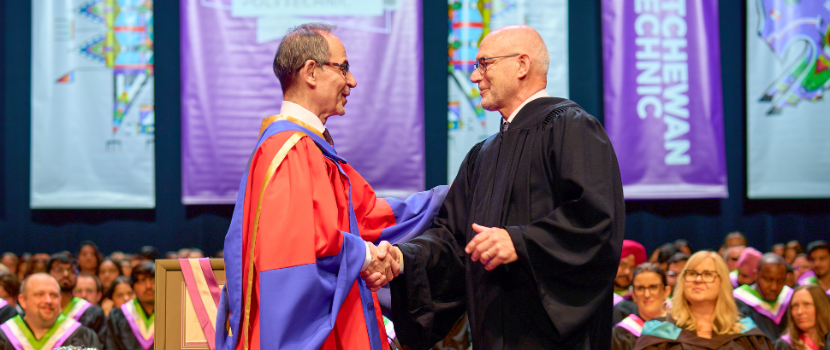 leon friesen receiving award