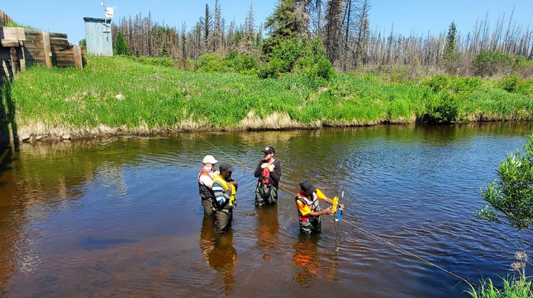 Bansah with students at Hannin Creek