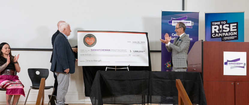 Malcolm J. Jenkins Family Foundation presenting a cheque to Dr. Larry Rosia