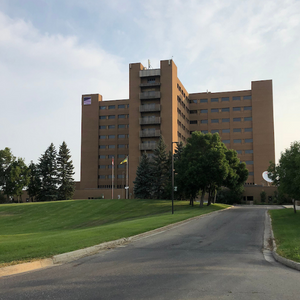 Front of and road up to Regina campus building